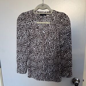 1. State leopard print top
